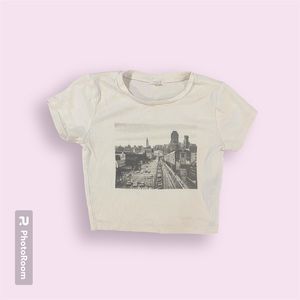 Garage black and white NYC baby tee